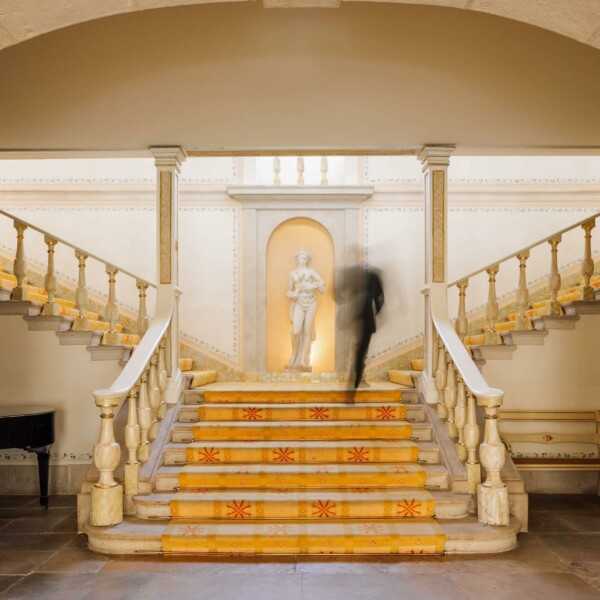 VALVERDE SINTRA PALÁCIO DE SETEAIS
Palatial Luxury Surrounded by Sintra’s Marvels
Valverde Sintra Palácio de Seteais is a five-star historic hotel located in Sintra, a resort town and UNESCO World Heritage Site. Much more than a luxury hotel, this magnificent property is a romantic palace with period architecture that will take you back to the elegance and atmosphere of the 18th century and the Age of Enlightenment.
A fascinating example of neoclassical residential architecture, the palace was originally built by the then Dutch Consul in Portugal, Daniel Gildemeester, to be his official residence.
During the 19th century, several distinguished Portuguese families lived at the Palace, including the fifth Marquis of Marialva, who built the triumphal arch linking the two wings of the Palace to commemorate a visit by King John VI and his Queen Carlota Joaquina. With a privileged location, the central arch provides perfect framing for the Moorish Castle and Pena Palace.
The property was transformed into a luxury hotel in 1955, combining the majesty and traditions of the 18th century with all of the comforts of the 21st century.
In 2009, the property underwent extensive remodelling and restoration work. All of the Palace’s furnishings, most of which date back to the 18th century, were restored by the highly regarded Portuguese Decorative Arts Museum team, from the Ricardo do Espírito Santo Silva Foundation. The work involved 14 art workshops and around 30 different specialists, who worked on the Palace over a 10-month period.
The approximately 2.000 pieces of art within Valverde Sintra Palácio de Seteais come from very different artistic areas and include furniture, lighting, textiles, tapestries, paintings, murals, easel paintings, engravings and porcelain.
Of special note is the unique Steingraeber grand piano, with its delicately painted pastoral scenes and golf leaf decoration, of which only five examples are known to have been built in the 19th century by this prestigious maker of the world’s finest pianos.The ultimate fairytale setting for magnificent stays, events and celebrations. ✨
vanguartour travelwithattitude portugal europe sintra palace